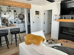 TV, fireplace - Black Brindle Bungalow, Downtown Ft. Myers: Walk to Best Eats and Shops! (Fort Myers)
