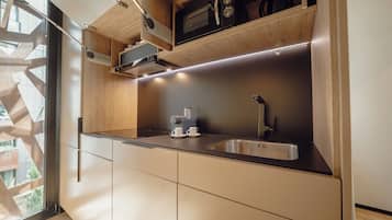 Apartamento premium | Cozinha privada | Geladeira, micro-ondas, cooktop, torradeira
