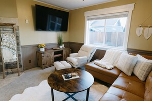 Smart TV, fireplace, DVD player, books
