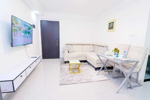 Luxury Apartment | Living area | 24-inch Smart TV with digital channels - Lux Suites Goldpark  Homes Kilimani (Nairobi)