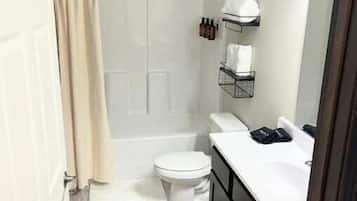 Hair dryer, towels, shampoo