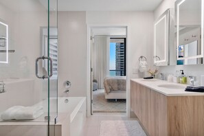 Shower, hair dryer, towels, soap