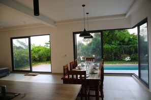 Dining - Oceanside villa with unencumbered views, serene lap pool-10 min to Safari Blue. (Zanzibar)