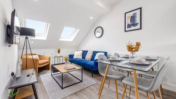 Standard Apartment | Living area | 43-inch Smart TV with digital channels, Netflix, streaming services