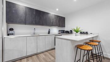 Superior Apartment | Private kitchen | Full-sized fridge, microwave, oven, stovetop