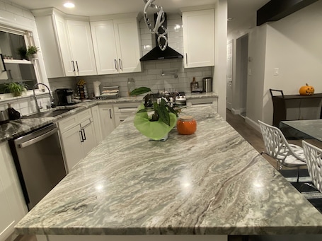 Fridge, microwave, oven, stovetop. Contemporary Cozy Cottage