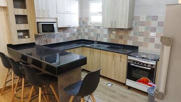 Fridge, microwave, oven, electric kettle