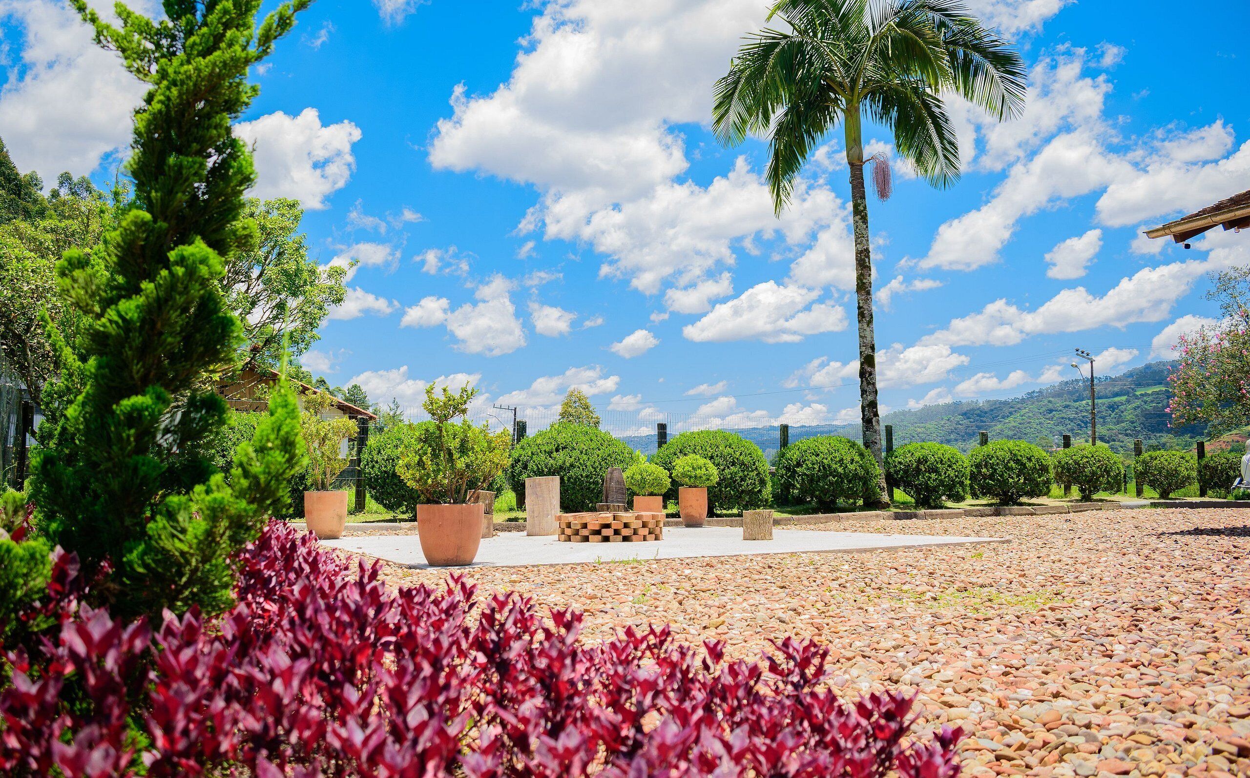 Presidential House, Fireplace, Garden View | Room amenity