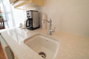 Fridge, microwave, dishwasher, coffee/tea maker