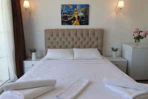 Quarto standard | Roupas de cama premium, frigobar, escrivaninha