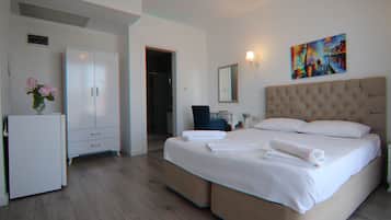 Premium bedding, minibar, desk, laptop workspace