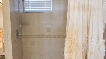 Shower, towels, toilet paper