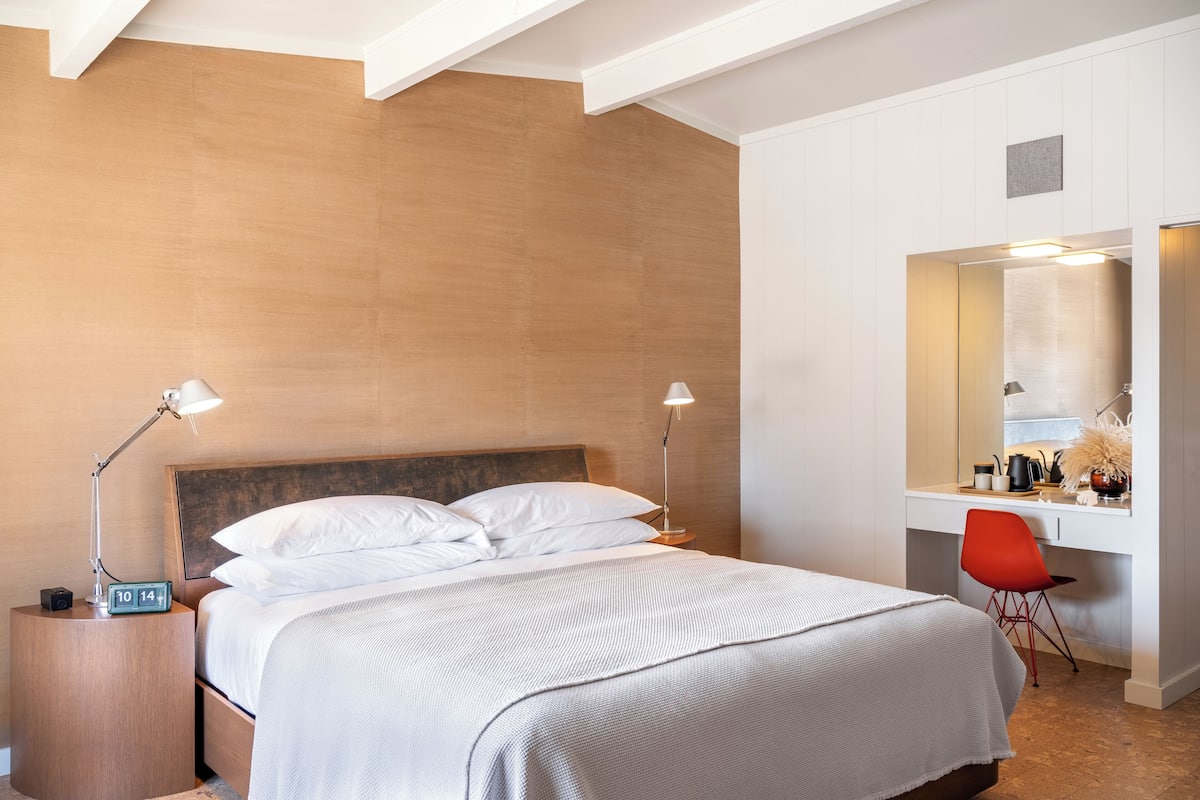 Farmhouse Room | Frette Italian sheets, premium bedding, down comforters, blackout drapes