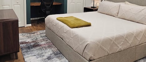 1 bedroom, desk, iron/ironing board, travel crib