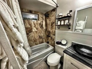 Hair dryer, towels, soap, shampoo