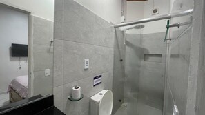 Shower, towels, soap, toilet paper