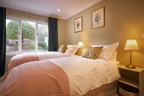 4 bedrooms, iron/ironing board, travel cot, WiFi