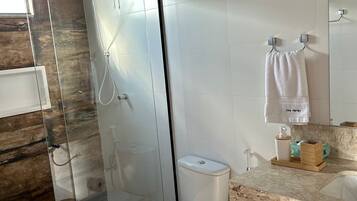 Hair dryer, towels, soap, shampoo