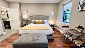 1 bedroom, desk, iron/ironing board, travel crib