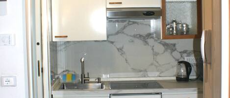 Fridge, microwave, stovetop, electric kettle