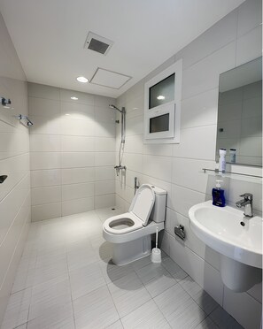 Hair dryer, bidet, towels, soap