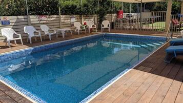 15 outdoor pools, pool loungers