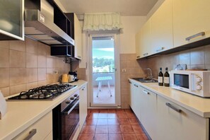 Private kitchen - [50 mt from the Sea]10 places Climate Terrace Parking (Porto San Giorgio)
