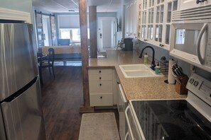 Fridge, microwave, oven, stovetop - Peninsula Point | Cozy Lakefront Condo 2BR, 1BA (Montague)