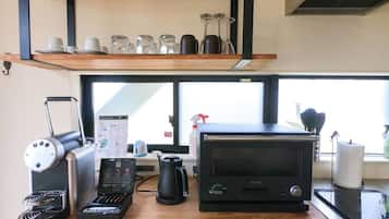 Fridge, microwave, cookware/dishes/utensils