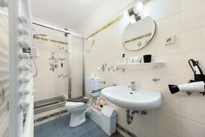 Ducha, secador de pelo