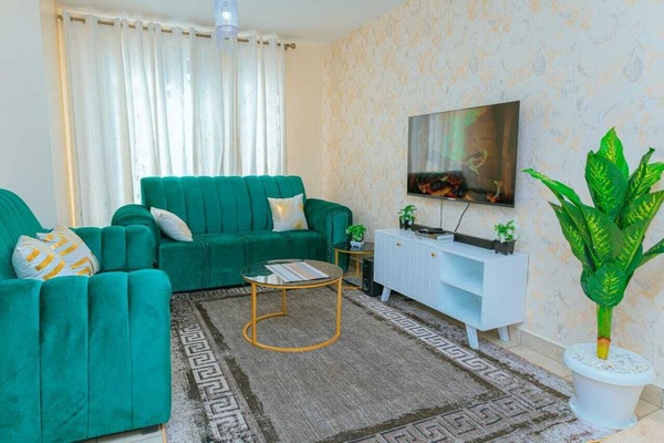 Business Apartment | Living area | 24-inch Smart TV with digital channels