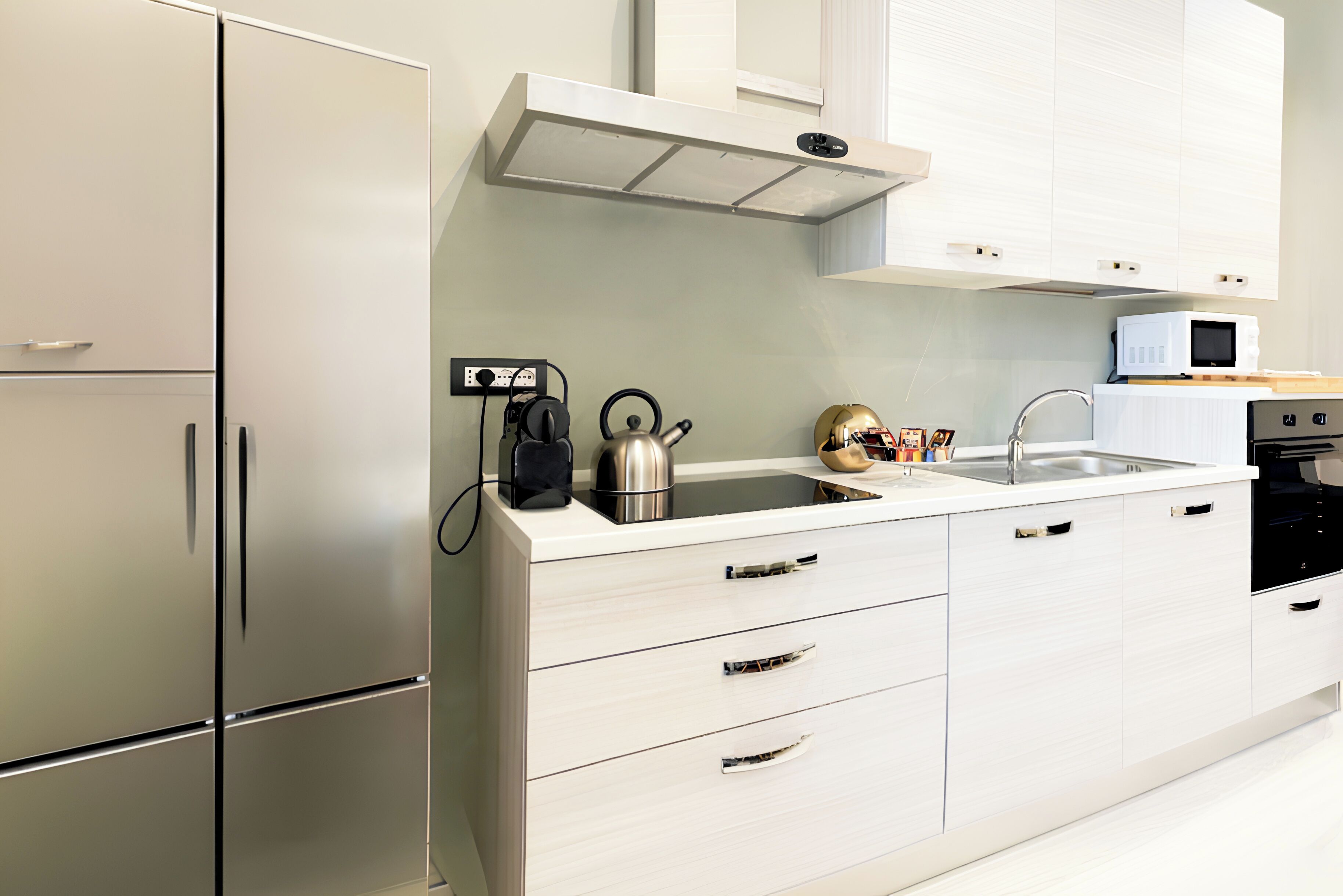 Coffee/tea maker, fridge, microwave, oven