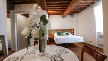 Deluxe Triple Room, Sea View | Hypo-allergenic bedding, down comforters, minibar, in-room safe