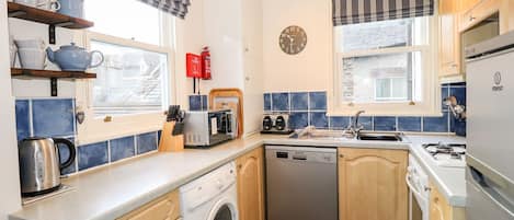 Dishwasher, electric kettle, toaster, cookware/dishes/utensils