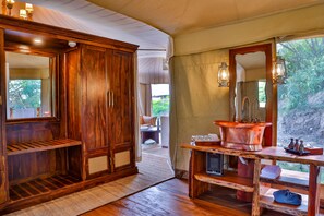 Shower, rainfall showerhead, designer toiletries, hair dryer