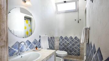 Hair dryer, bidet, towels, soap