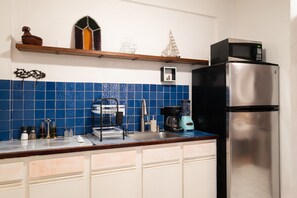 Fridge, microwave, coffee/tea maker, electric kettle