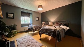 4 bedrooms, desk, iron/ironing board, travel cot