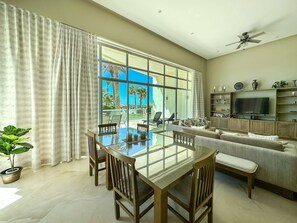 TV - Splash into Style Ground Floor Poolside Condo #103 (Puerto Peñasco)