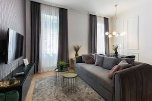 Deluxe Apartment | Living area | LCD TV