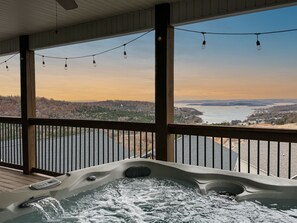A hot tub with a view of a river and hills. - By SDC, Indoor Pool, Hot Tub, Incredible Lake View, Pool Table (Branson)