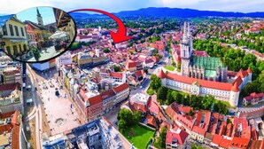 An aerial view of a historic town with a prominent church, a castle, and a bustling square. - Candy Rose Lux Zagreb Center Apartment (Zagreb)
