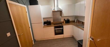 Apartment | Private kitchen | Fridge, microwave, oven, stovetop