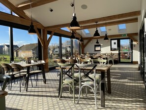 Dining - Cosy cottage for family fun with log-burner, spa, private parking, EV & pools (CIRENCESTER)