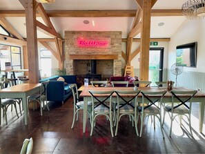 Dining - Cosy cottage for family fun with log-burner, spa, private parking, EV & pools (CIRENCESTER)
