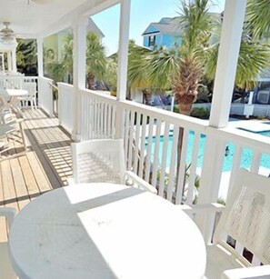 Outdoor dining - Oceanview 4 BR Beach House with Shared Pool! Portofino II 313A (Surfside Beach)