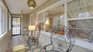 A sunlit room with patterned flooring, a bench, and two ornate chairs. - Vintage Coloma Home w/ Deck: Shop, Swim & Dine! (Coloma)