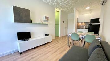 Apartment, 1 Bedroom, Balcony, Pool View | Living room