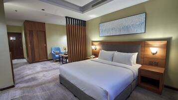 Suite – junior | Senger med overmadrass og minibarvarer (inkludert)