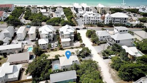 A coastal residential area with white houses, a clear view of the beach, and a marked location. - Seagrove "30Astrella Del Mar" |4BR |Private Pool|3min walk to beach access! (Santa Rosa Beach)